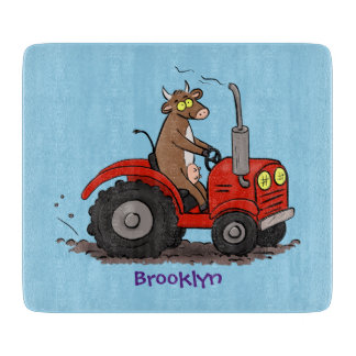 Cute happy cow driving a red tractor cartoon cutting board