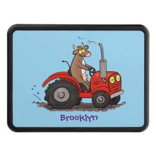 Cute happy cow driving a red tractor cartoon hitch cover