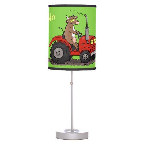 Cute happy cow driving a red tractor cartoon table lamp