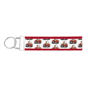 Cute happy cow driving a red tractor cartoon wrist keychain
