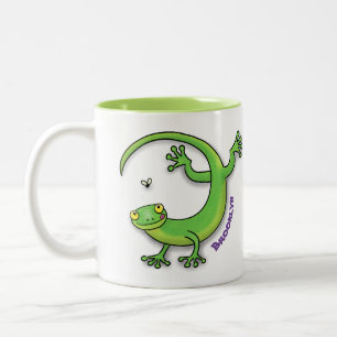 Cute happy green gecko lizard with bug cartoon Two-Tone coffee mug