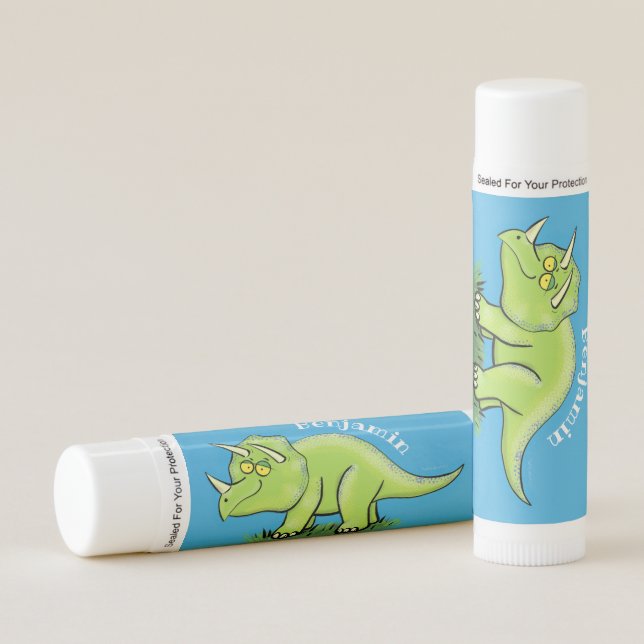 Cute happy green triceratops dinosaur cartoon lip balm (Front)