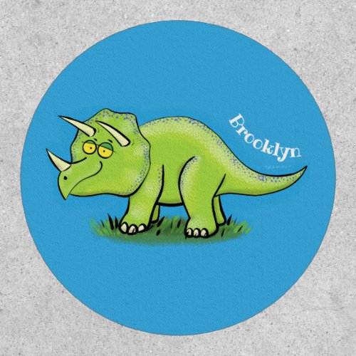 Cute happy green triceratops dinosaur cartoon patch