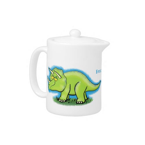 Cute happy green triceratops dinosaur cartoon teapot