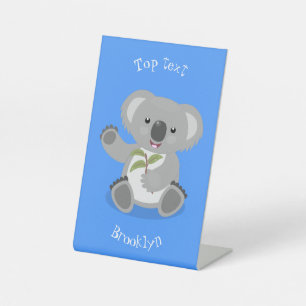 Cute happy koala waving cartoon illustration pedestal sign