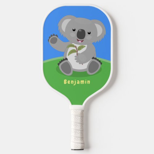 Cute happy koala waving cartoon illustration  pickleball paddle