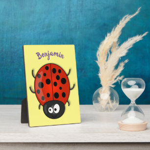 Cute happy red ladybug cartoon illustration plaque