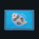 Cute happy sea otter blue cartoon illustration trifold wallet<br><div class="desc">This cute sea otter is resting in the ocean on cool cartoon illustration style. That otter make anyone happy!</div>