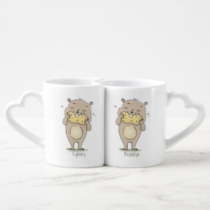 Cute happy smiling hamster with peanut cartoon coffee mug set