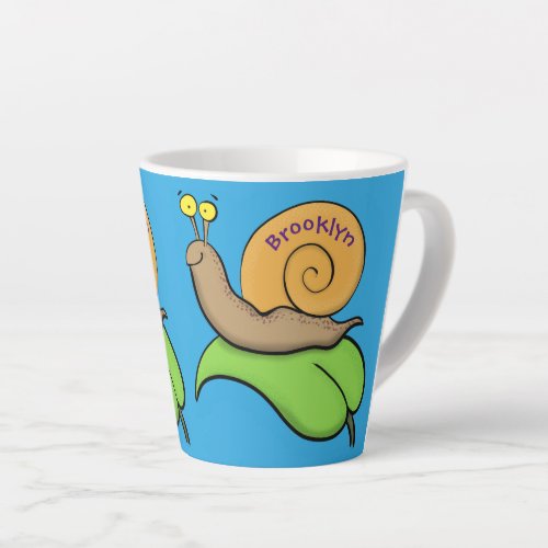 Cute happy snail on a leaf cartoon illustration latte mug