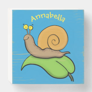 Cute, happy snail on a leaf cartoon illustration wooden box sign