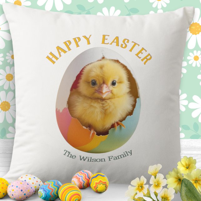 Cute Hatching Chick Colorful Happy Easter Egg Throw Pillow (A pillow with Happy Easter words and picture of a cute yellow chick hatching out of a colorful egg)