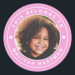 Cute Hearts Circle Frame Photo Name School Pink Classic Round Sticker<br><div class="desc">These adorable,  modern styled stickers feature your kiddo's photo at the center,  with a pink circle frame! Text templates are included for easy personalization. Great for labeling Back to School supplies,  books,  and more! Two little white hearts add an extra cute touch.</div>