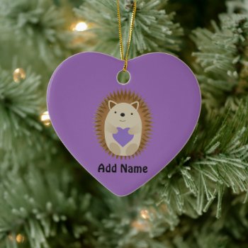 Cute Hedgehog Holidng A Purple Heart Ceramic Ornament by Egg_Tooth at Zazzle