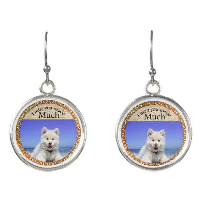 Cute Husky's with blue eye sitting on the beach Earrings (Front)