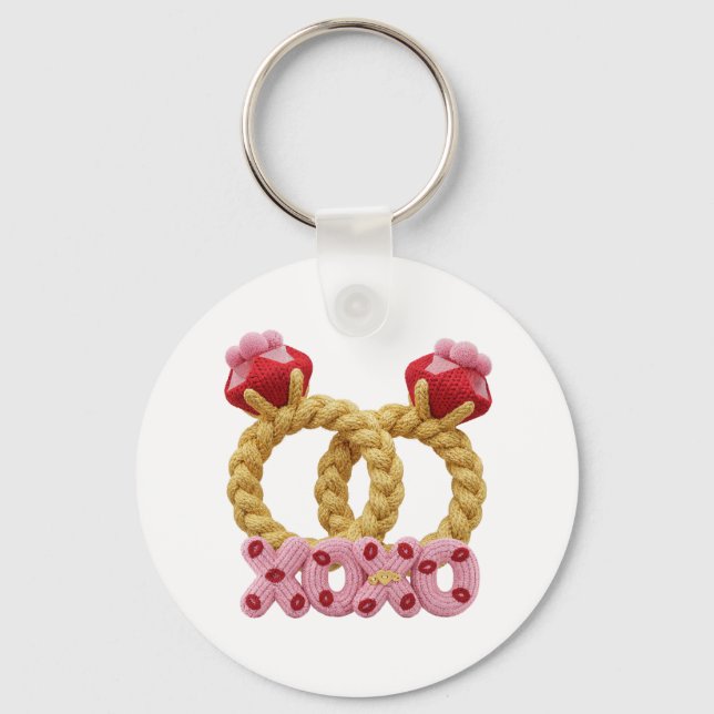 Cute intertwined knitted wedding rings with pink  keychain (Front)