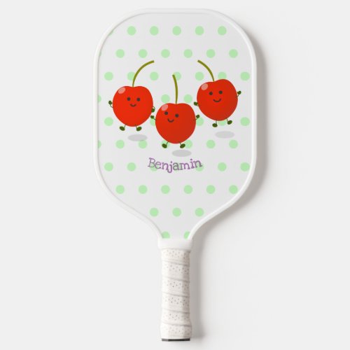 Cute jumping red cherries cartoon illustration pickleball paddle