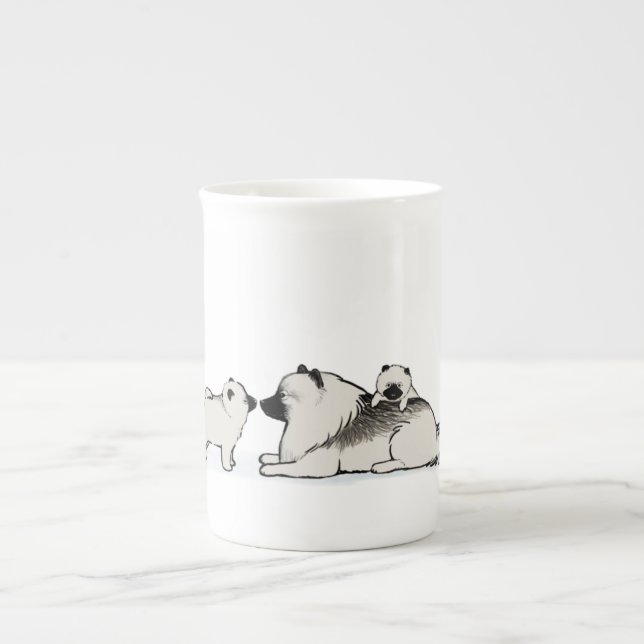 Cute Keeshond Family with Blue Sock | Keesie Dogs Bone China Mug (Front)
