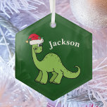 Cute Kids Christmas Dinosaur Green Personalized Glass Ornament<br><div class="desc">Awesome green dinosaur smiling and looking very cute in a holiday red Santa hat. I like prehistoric Christmas animals and presents that kids will love. Customize this gift with the recipient's name to make it even more personalized.</div>