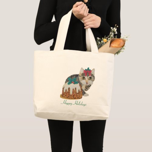 cute kitten gray tabby licking paw christmas large tote bag