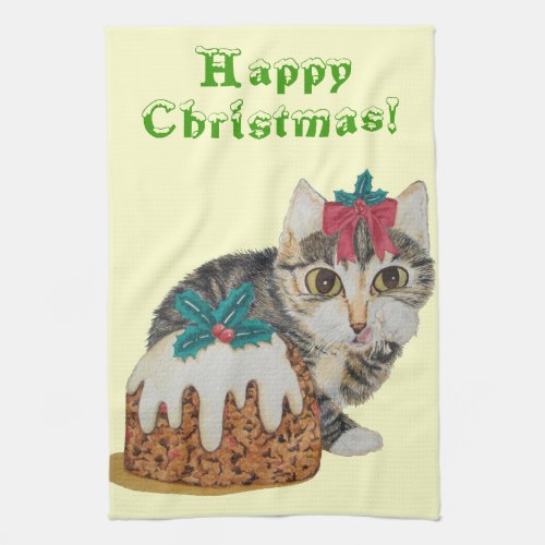 cute kitten gray tabby licking paw christmas towel