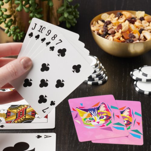 Cute kitten in colorful polygons playing cards