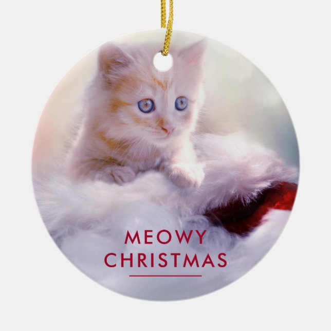 Cute Kitten Resting On a Santa Hat Meowy Christmas Ceramic Ornament (Front)