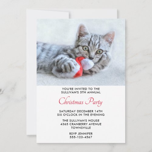 Cute Kitty Biting a Red Santa Hat Christmas Party Invitation