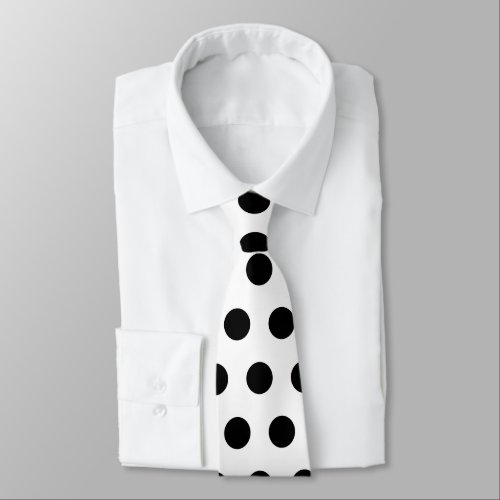 Cute large black polka dots pattern on white neck tie