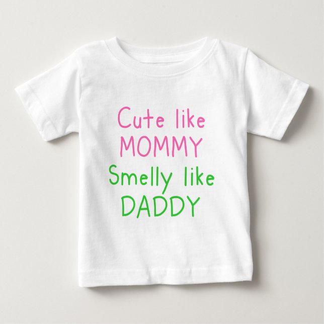 Cute Like Mommy, Smelly Like Daddy Baby T-Shirt (Front)