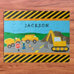 Cute Little Boy Construction Vehicle Monogrammed Jigsaw Puzzle<br><div class="desc">Got a little boy who loves construction vehicles? This jigsaw puzzle is perfect! The puzzle has a dump truck, cement truck, and excavator, all working together at a road construction site. A young boy stands near the front with a stop sign to help stop traffic. There are also orange safety...</div>