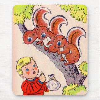 cute little boy feeds cute little squirrels mouse pad
