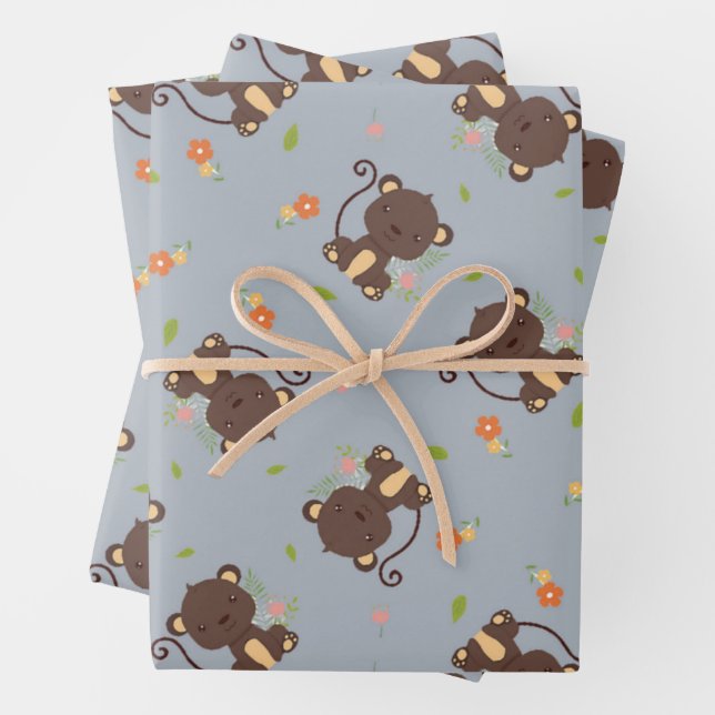 Cute little brown monkey floral blue wrapping paper sheets (In situ)