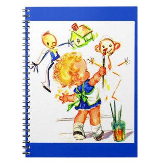cute little girl painting on the wall notebook