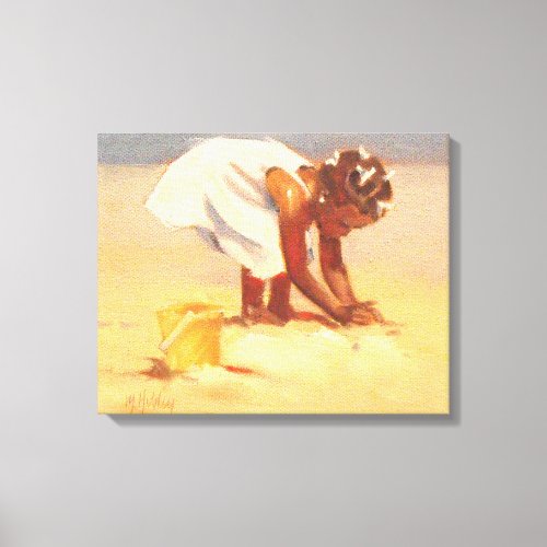 Cute little girl playing in sand canvas print