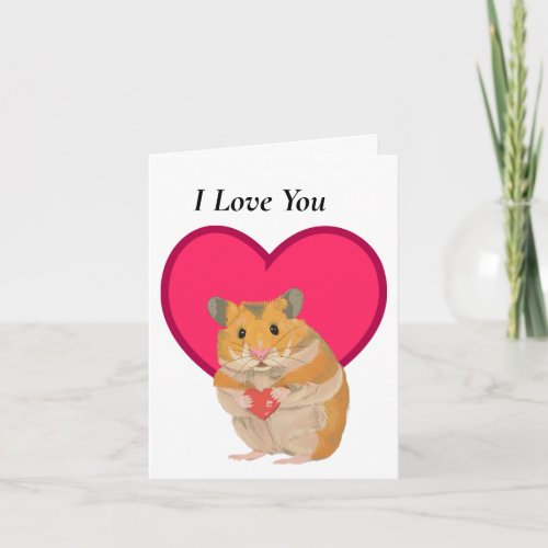 Cute little Hamster holding a red heart Valentines Card