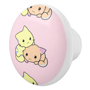 Cute little kitties on pink ceramic knob