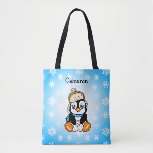 Cute Little Penguin in Winter Cap with Snowballs Tote Bag