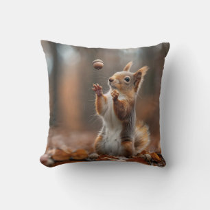 Cute little squirrel catching an acorn throw pillow