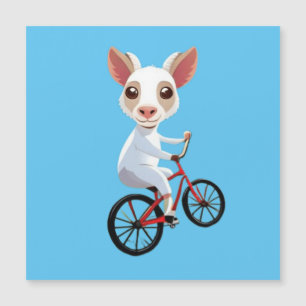 Cute little white goat on a bicycle