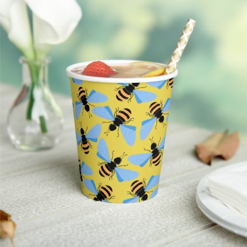 Cute modern bees illustration pattern on yellow paper cups