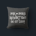 Cute Mr and Mrs chalkboard wedding throw pillows<br><div class="desc">Custom Mr and Mrs black chalkboard wedding throw pillow. Personalized black chalk board pillow cushions for sofa or bed.  Fun design with white heart and name of newly wed couple. Cute home decor personalized for bride and groom / husband and wife. Romantic wedding presents for newlyweds.</div>