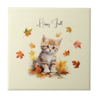 Cute Orange Tabby Kitten in Fall Leaves