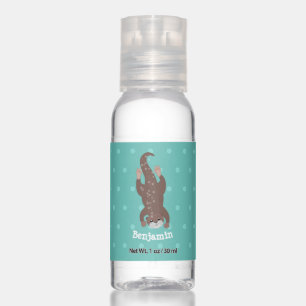 Cute otter diving on teal cartoon illustration hand sanitizer