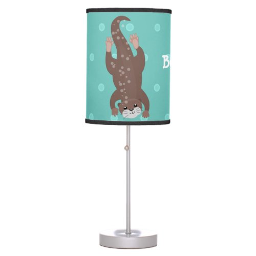 Cute otter diving on teal cartoon illustration table lamp