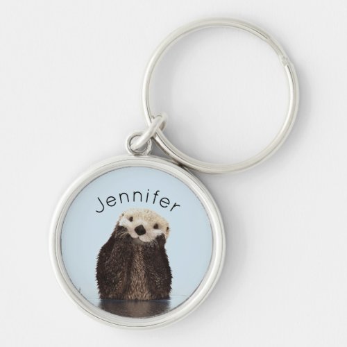 Cute Otter Standing in a Pond Holding his Face Keychain