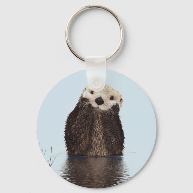 Cute Otter Standing in a Pond Holding his Face Keychain (Front)