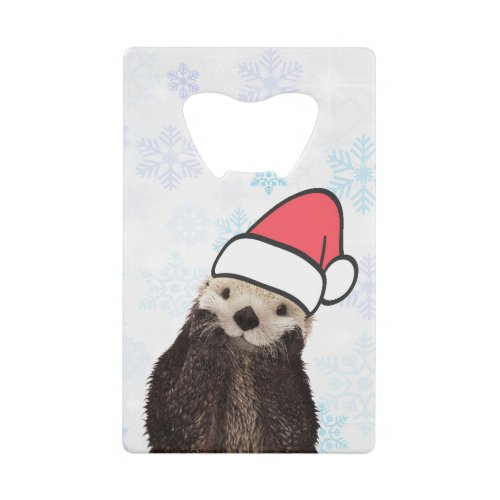 Cute Otter Wearing a Santa Hat Christmas Credit Card Bottle Opener