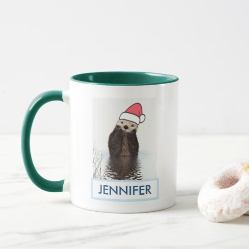 Cute Otter Wearing a Santa Hat Christmas Mug
