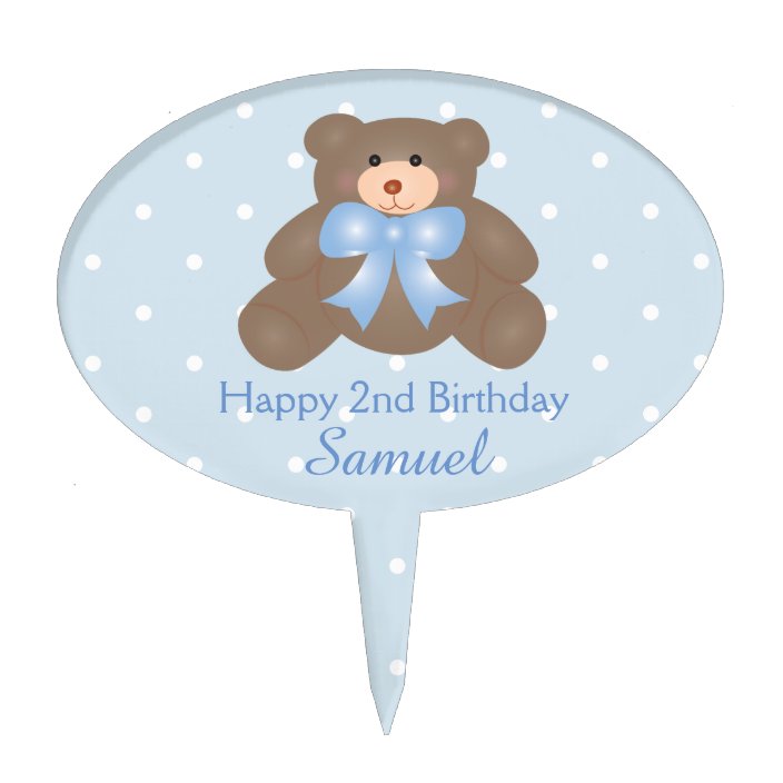 teddy bear with blue ribbon